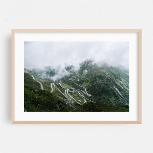 Winding Road Through the Clouds