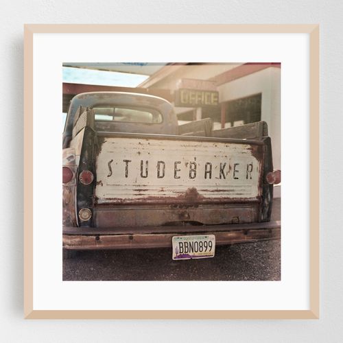 Vintage Studebaker resting along historic Route 66 captures nostalgia of American road trips