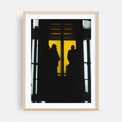 Silhouettes on an Elevator