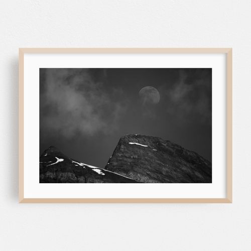 Moon Over a Mountain in the Swiss Alps