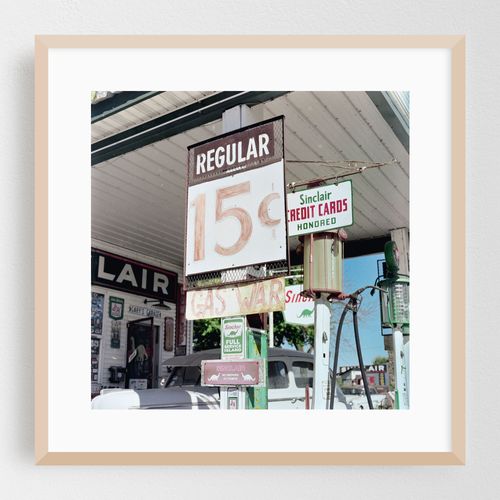 Nostalgic Route 66 gas station showcasing vintage fuel prices and retro signage