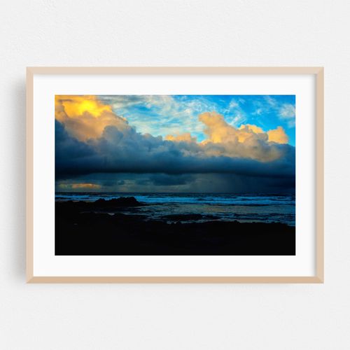 Dramatic Ocean Storm Clouds at Sunset