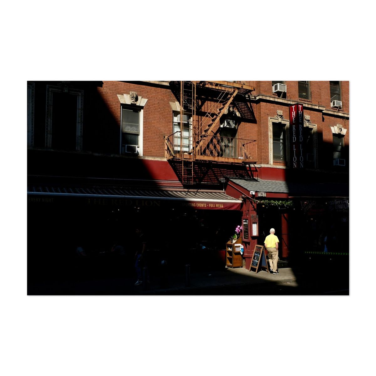 The Red Lion Pub in the Shadows – image 1 of 2