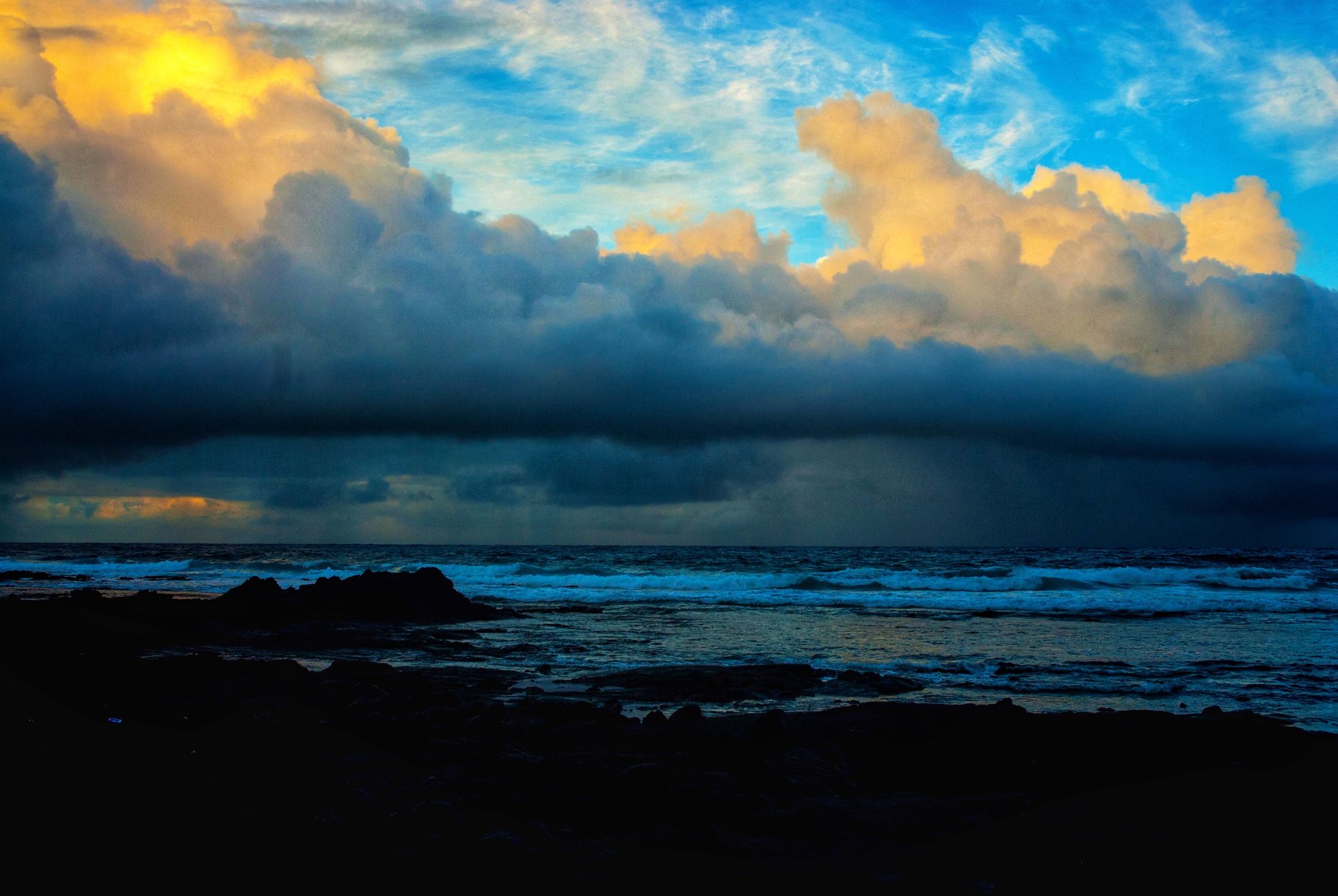 Dramatic Ocean Storm Clouds at Sunset