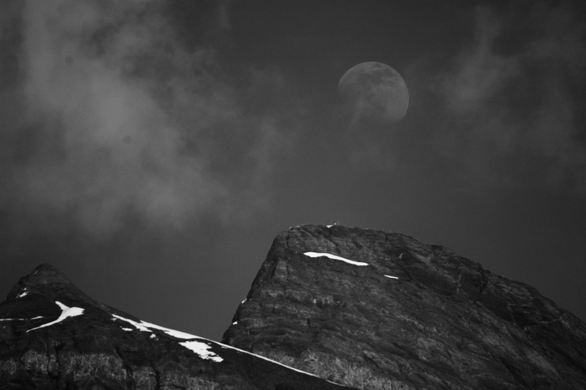 Moon Over a Mountain in the Swiss Alps